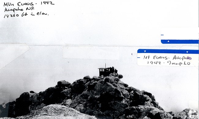 Temporary Lookout building at summit of Mt. Evans to determine the value of high altitude observations vs. those from stations at lower elevations. 8/14/42 F.R Johnson - Arapho N.F.