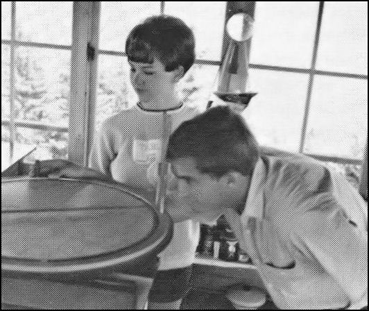 Mr. and Mrs. Dave Hoover, husband and wife team, in days when the lookout was also a fireman